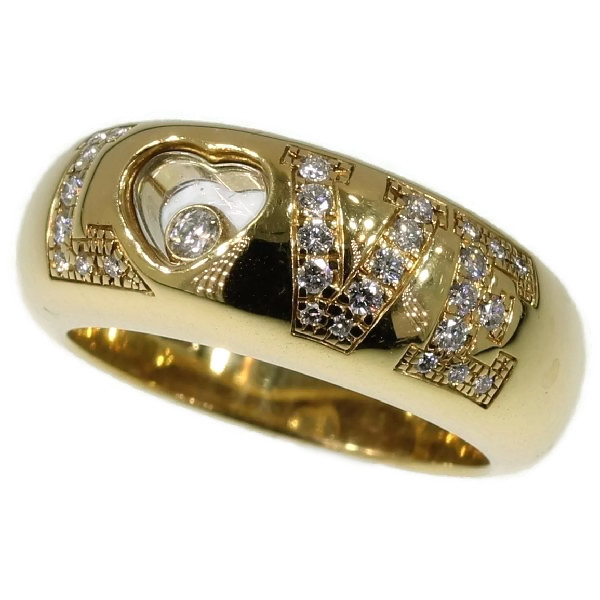 Signed Chopard love ring with happy diamond in heart shape and brilliants